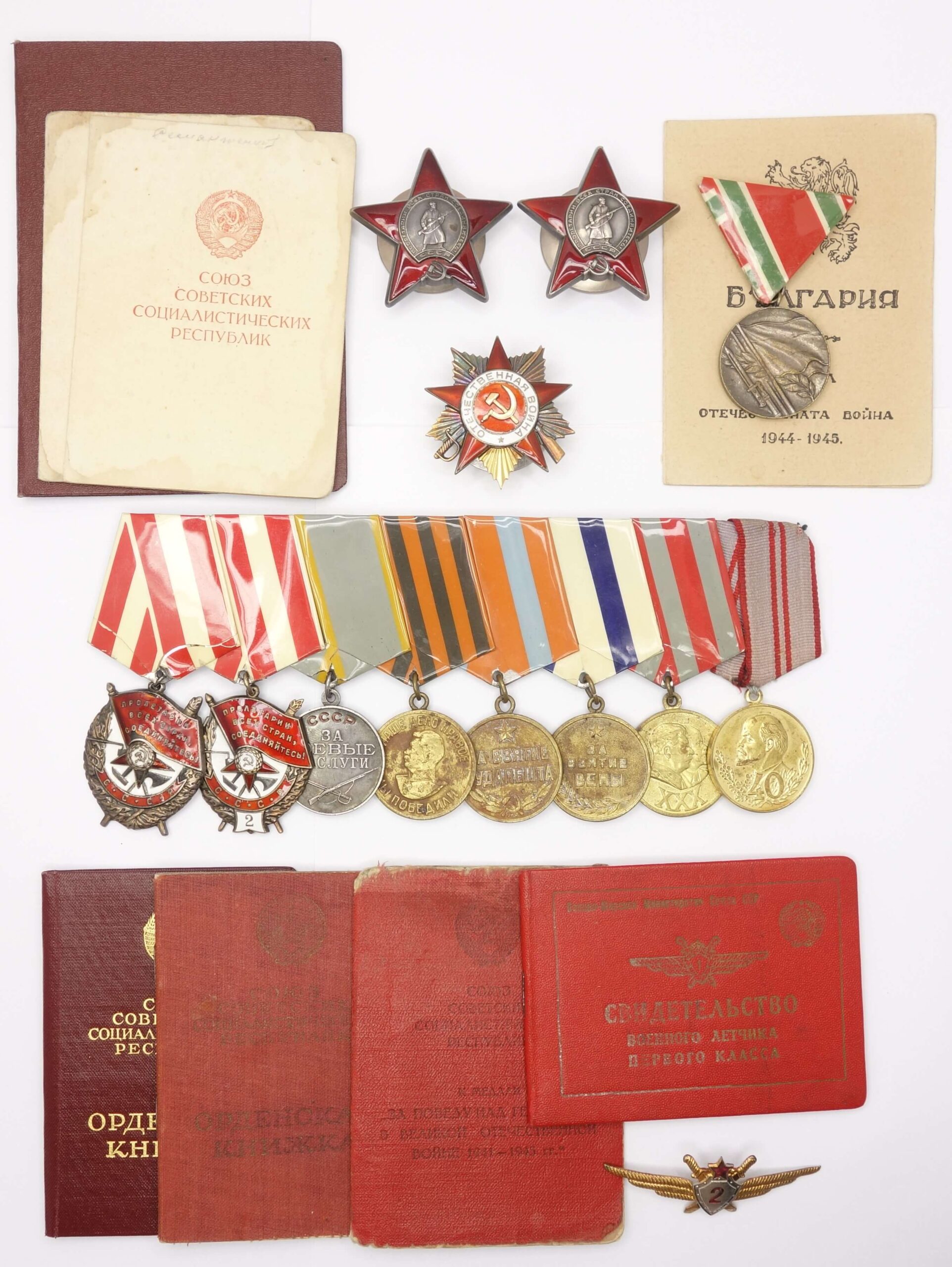 Documented Group of Fighter Pilot Awards. Red Banner 1st (#216370) and 2nd award (#25742), Order Patriotic war 1st class (#152045) and more