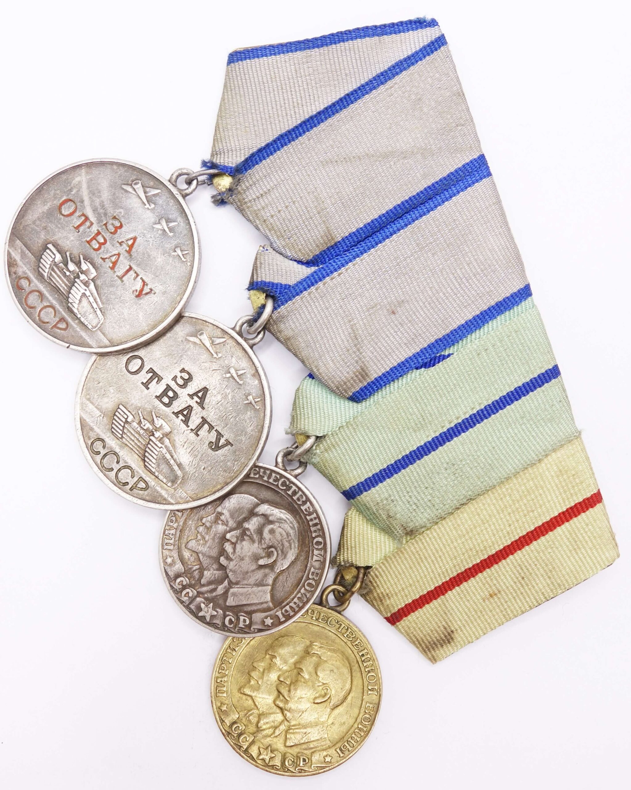 Soviet Partisan medal bar with a Partisan Medal 1st and 2nd class, Medal for Bravery #16869 and #1124011