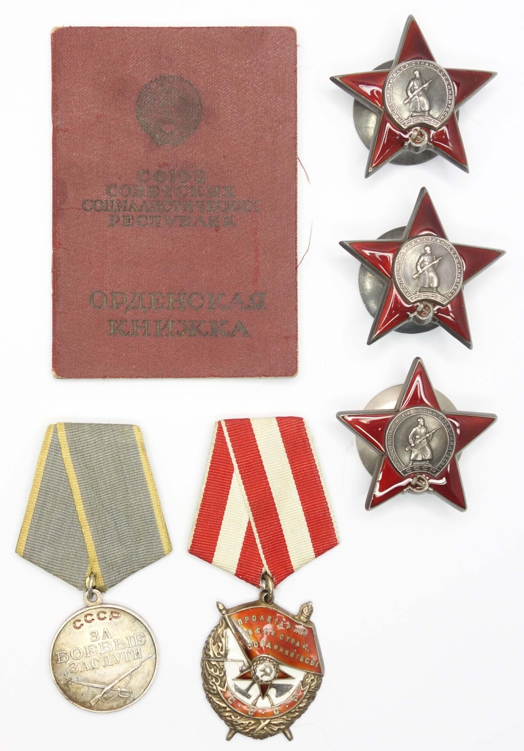 Documented group of Soviet Awards: Red Banner #265254, Red Star #815465, #815600 & #3295575, Medal for Combat Merit