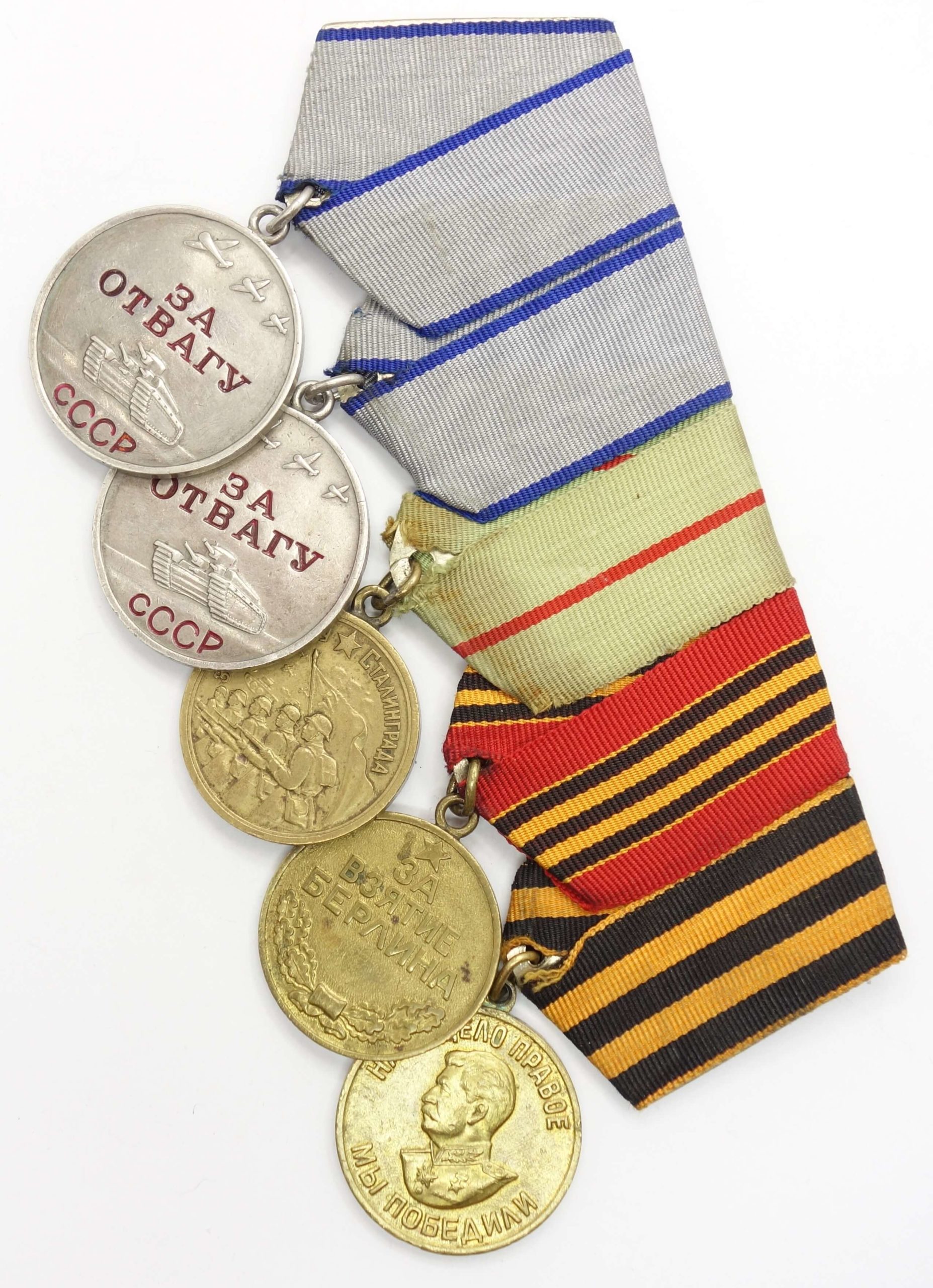 Group of Soviet medals consisting of 2 Medals for Bravery #2149250 & #2191868 + Medals for Stalingrad, Berlin and Victory over Germany