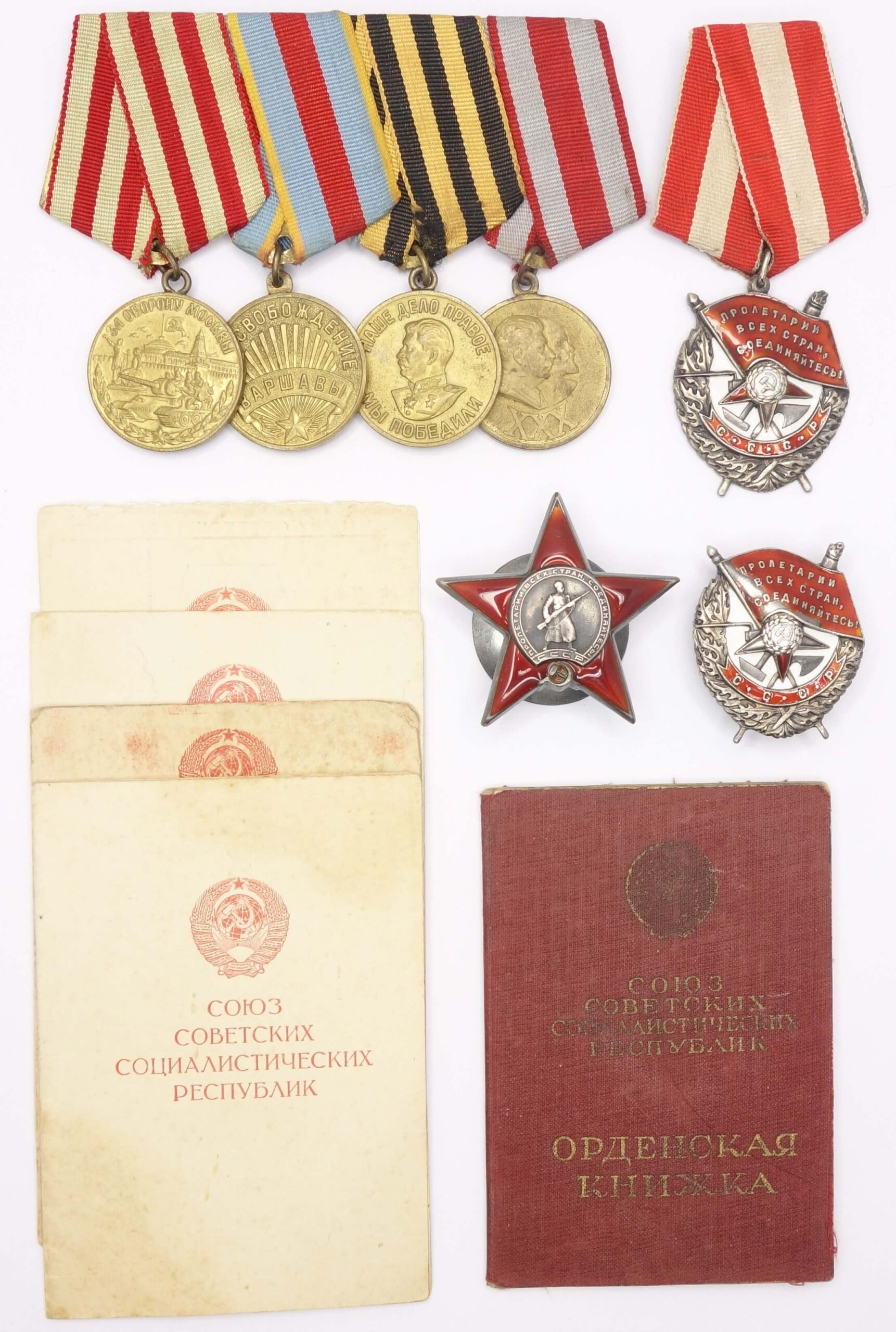 Documented group of Soviet Orders and Medals: 2x Red Banner #44223 + #318373, Red Star #241836 and medals